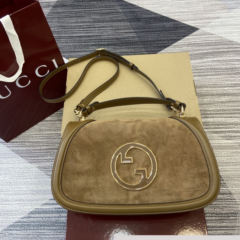 G*u*i top handle bags